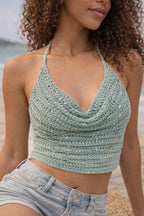 Close up of handmade crochet texture on halter crop top